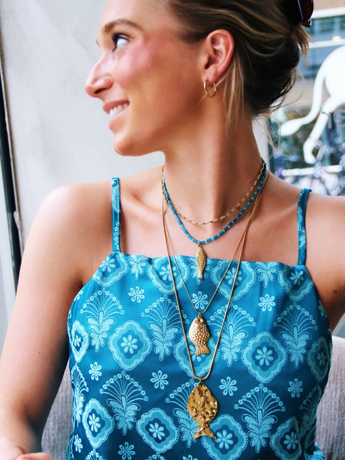 Beaded necklace of tubes with fish - blue/light green
